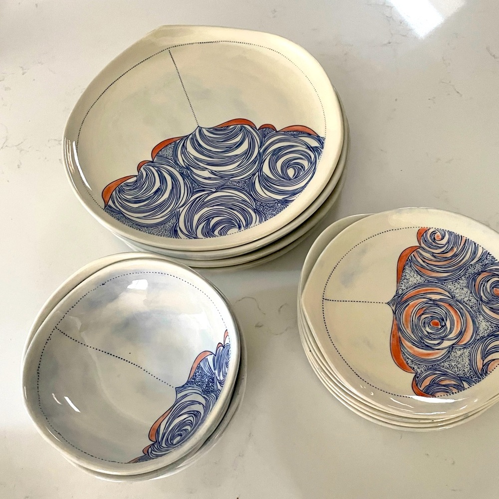 7 sets of Anthropologie dishes with dinner + salad plates and bowls!